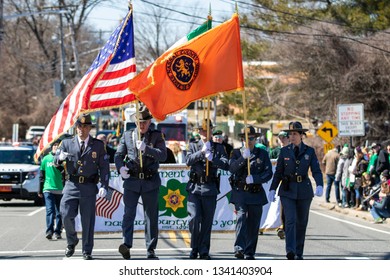 Wantagh, New York - March 17, 2019 : Nassau County Police Department Marching In The First Annual St. Patrick’s Day Parade. Long Island