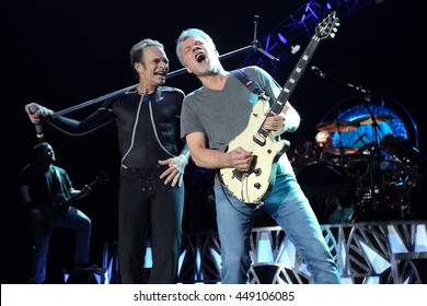 WANTAGH, NY-AUG 14: David Lee Roth (L) And Eddie Van Halen Of Van Halen Perform Onstage At Jones Beach Theater On August 14, 2015 In Wantagh, New York.