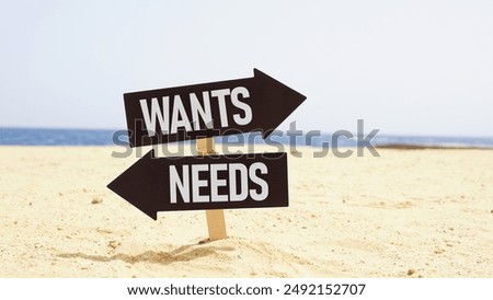 Wants and Needs are shown using a text on the road sign