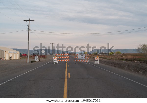 Wapato, Washington, USA March 28, 2021; road block\
lateral A road wapato washington for car accident that took down\
power lines