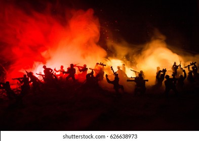 War Concept. Military silhouettes fighting scene on war fog sky background, World War Soldiers Silhouettes Below Cloudy Skyline At night. Attack scene. Armored vehicles. Tanks battle - Shutterstock ID 626638973