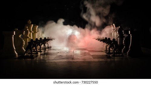 War Concept. Silhouettes Of Soldiers On Chessboard. War Concept. Military Silhouettes Fighting Scene On War Fog Sky Background, Chess Board Game Concept Of Business Ideas And Competition And Strategy