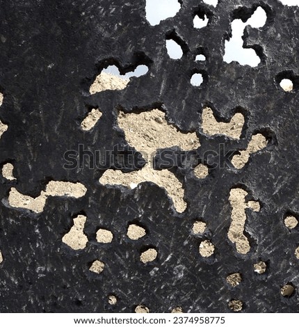 War, hole in a wall and damage on a battlefield due to shooting, fighting or conflict closeup outdoor. Building, warzone and destruction pattern of a metal plate texture for army or military armor Zdjęcia stock © 