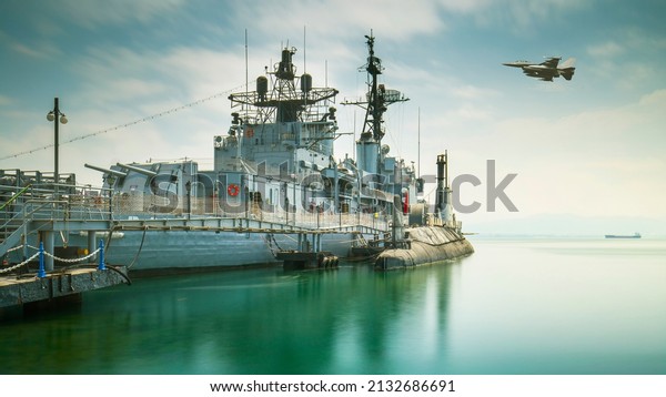war\
preparations and naval forces.warship and submarine that provides\
protection of countries from the sea. fighter jet in the sky during\
preparations for war. defense industry\
investments.
