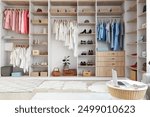 Wardrobe with different clothes and accessories in dressing room