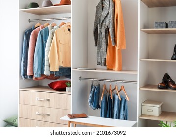 Wardrobe With Stylish Female Clothes In Walk-in Closet