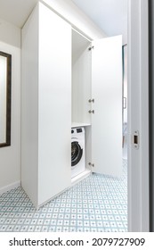 Wardrobe For Washer And Dryer In The Hallway Of A Small Apartment