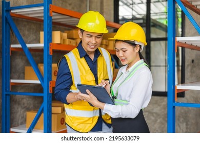 Warehouse Asian Employees Working Together On Counting Products And Checking Inventory In Storage.