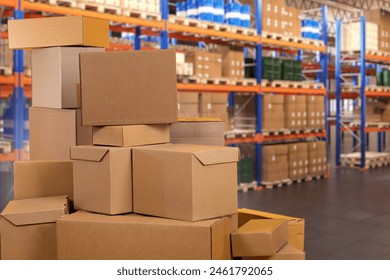 Warehouse with boxes. Logistics center. Storage area of industrial enterprise. Stack of boxes. Warehouse racks with barrels and parcels. Storehouse for factory. Warehouse without anyone. Art focus - Powered by Shutterstock