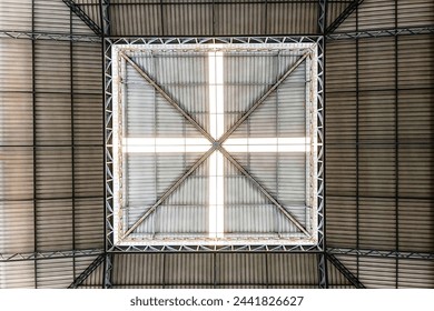 Warehouse Corrugated Ceiling with Cantilever Struts and a Skylight in Black and White. Roof designed with geometric shapes - Powered by Shutterstock