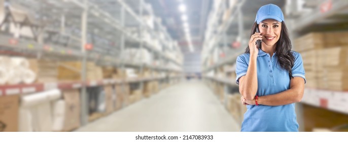 The warehouse employee handles the order with the customer in front of a huge warehouse with goods. - Powered by Shutterstock