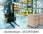 Warehouse enterprise. Forklift inside logistics center. Courier service warehouse. Parcels on pallets. Forklift for moving goods around warehouse. Modern storage area. Storage hangar with high racks