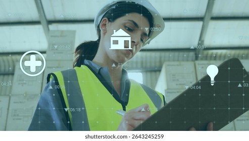 Warehouse inspector in safety helmet, neon vest checking inventory on clipboard, with digital icons. Inventory, logistics, monitoring, technology, organization, efficiency, industrial
