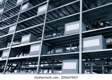 Warehouse Interior With Cardboard Boxes On Shelves Close Up