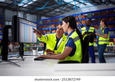 Warehouse Inventory Management On Computer. Staff In Office - Powered by Shutterstock