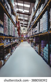 Warehouse isle with no people - Shutterstock ID 388058392