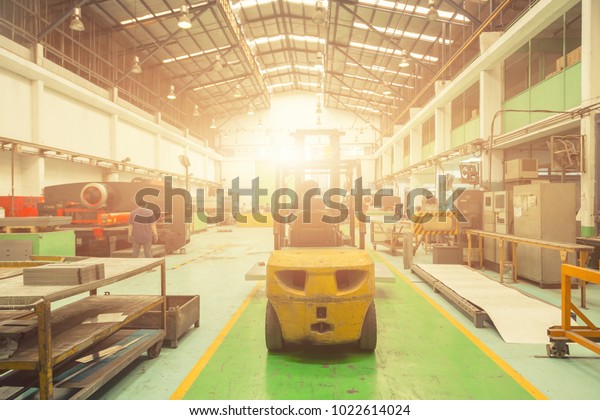 Warehouse\
logistics work being done with\
forklift