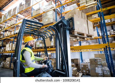 Warehouse Man Worker With Forklift.