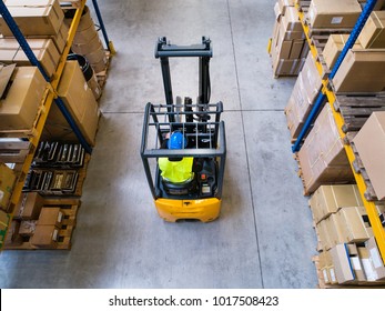 Warehouse Man Worker With Forklift.