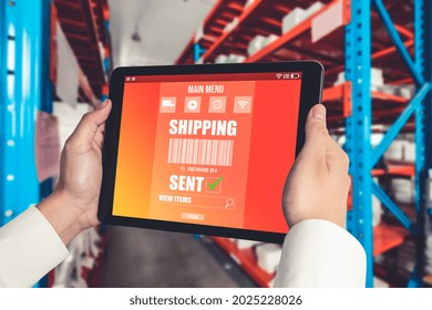 Warehouse management innovative software in computer for real time monitoring of goods package delivery . Computer screen showing smart inventory dashboard for storage and supply chain distribution .
