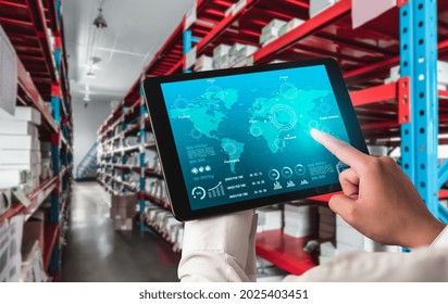Warehouse management innovative software in computer for real time monitoring of goods package delivery . Computer screen showing smart inventory dashboard for storage and supply chain distribution .
