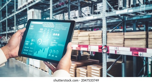 Warehouse management innovative software in computer for real time monitoring of goods package delivery . Computer screen showing smart inventory dashboard for storage and supply chain distribution . - Shutterstock ID 2047533749