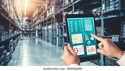 Warehouse management innovative software in computer for real time monitoring of goods package delivery . Computer screen showing smart inventory dashboard for storage and supply chain distribution . - Shutterstock ID 2049360440