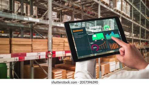Warehouse management innovative software in computer for real time monitoring of goods package delivery . Computer screen showing smart inventory dashboard for storage and supply chain distribution . - Shutterstock ID 2057396390