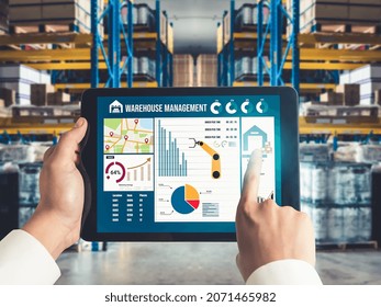 Warehouse management innovative software in computer for real time monitoring of goods package delivery . Computer screen showing smart inventory dashboard for storage and supply chain distribution .