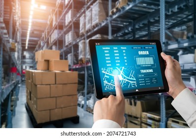 Warehouse management innovative software in computer for real time monitoring of goods package delivery . Computer screen showing smart inventory dashboard for storage and supply chain distribution . - Shutterstock ID 2074721743