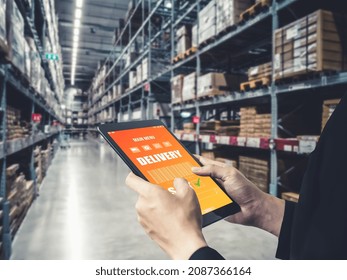 Warehouse management innovative software in computer for real time monitoring of goods package delivery . Computer screen showing smart inventory dashboard for storage and supply chain distribution .