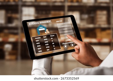 Warehouse management innovative software in computer for real time monitoring of goods package delivery . Computer screen showing smart inventory dashboard for storage and supply chain distribution .