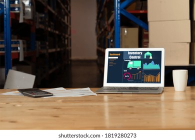 Warehouse management software application in computer for real time monitoring of goods package delivery . PC screen showing smart inventory dashboard for storage and supply chain distribution .