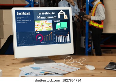Warehouse management software application in computer for real time monitoring of goods package delivery . PC screen showing smart inventory dashboard for storage and supply chain distribution .