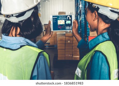 Warehouse management software application in computer for real time monitoring of goods package delivery . PC screen showing smart inventory dashboard for storage and supply chain distribution .