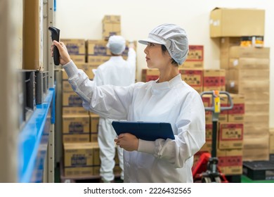 Warehouse management system with barcode reader and tablet PC. Inventory control. - Powered by Shutterstock