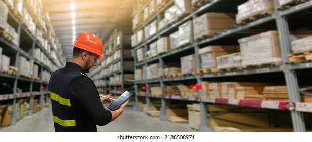 warehouse management system. Man Worker hands holding tablet on warehouse logistic network distribution and smart transportation Logistic import export and industry. - Powered by Shutterstock