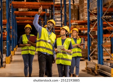 A warehouse manager guiding a diverse team during an inspection, pointing out details while staff take notes and observe. - Powered by Shutterstock