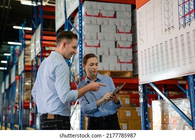 Warehouse manager talking and using digital tablet while checking product in warehouse, Logistic industry concept.