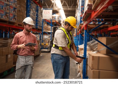 Warehouse manager talking and using digital tablet while checking product in warehouse, Logistic industry concept.