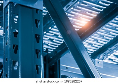 Warehouse racks metal dismountable constructions, modern warehouse technology background concept, vertical orientation, close-up with perspective, view from the bottom to top - Powered by Shutterstock