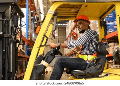 warehouse, radio, and forklift in shipping warehouse. Male transport worker in safety uniform transport worker talking on walkie talkie, drives forklift at freight cargo warehouse port - Powered by Shutterstock