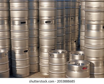 warehouse of special barrels for beer storage - kegs, new aluminum kegs