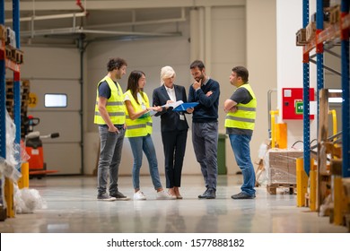 Warehouse Staff Meeting, Workers With Managers