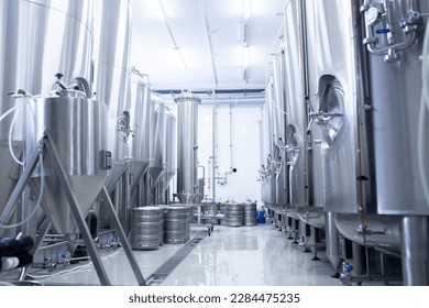 warehouse of stainless steel tanks on the alcohol production factory - Powered by Shutterstock