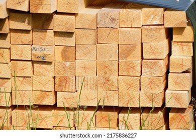 Warehouse Of Wooden Beams At The Construction Site - Planed Boards For Purlins