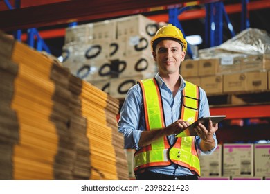 warehouse worker check stock, control stock, and warehouse management. logistics concept, factory, business, export industry. - Powered by Shutterstock