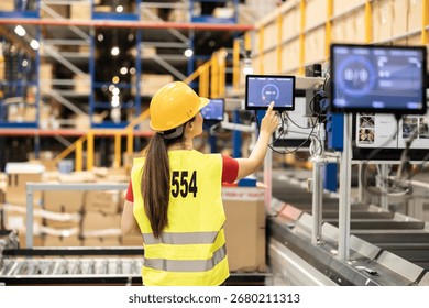 A warehouse worker engages with sorting technology, emphasizing the importance of accuracy and speed in logistics operations.