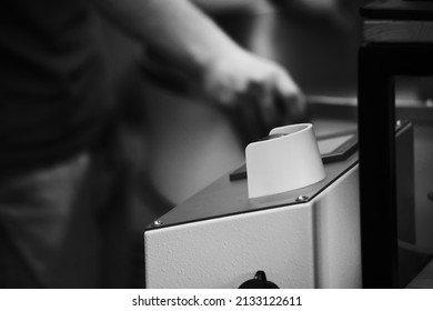 warehouse worker in front of the production process control button in the production shop, monochrome