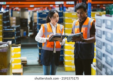 Warehouse worker and manager checks stock and inventory with digital tablet computer in the retail warehouse full of shelves with goods. Working in logistics, Distribution center. - Powered by Shutterstock